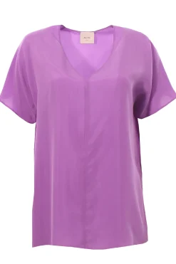 Blusa in seta collo a v