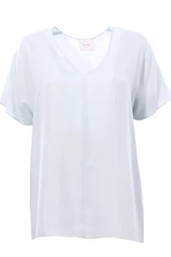 Blusa in seta collo a v