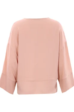 Blusa in seta con applicazione monile