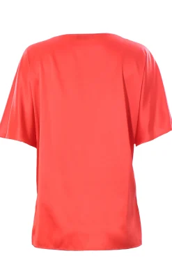 Blusa in seta con monile