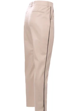 Pantaloni in ecopelle con piping laterale